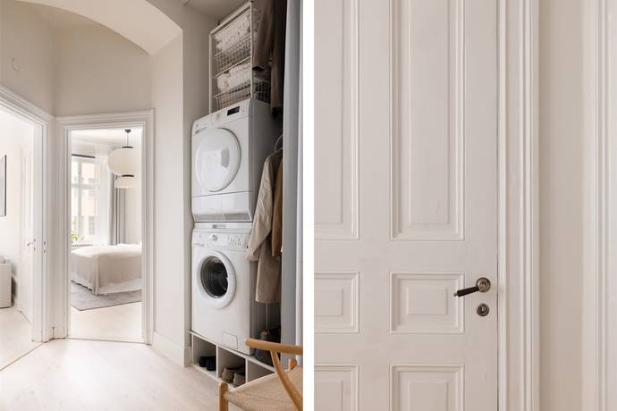 Hallway with washer/dryer and bedroom doorway