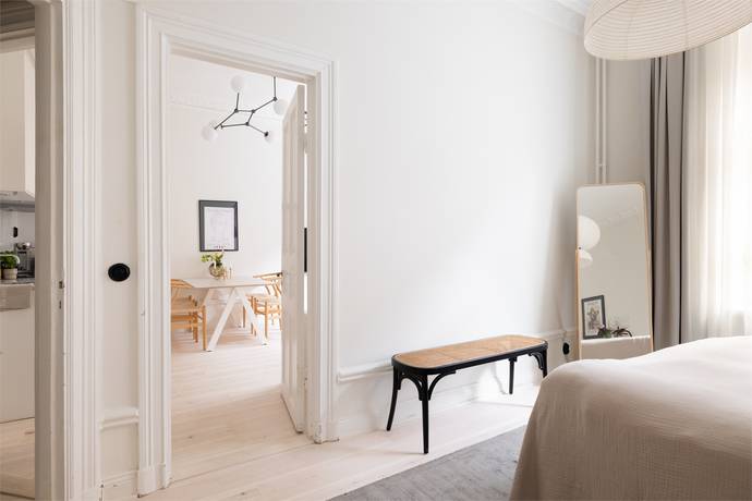 Bedroom with doorway to living area